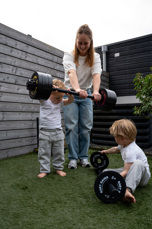 Dad and his kid moving through a session at home