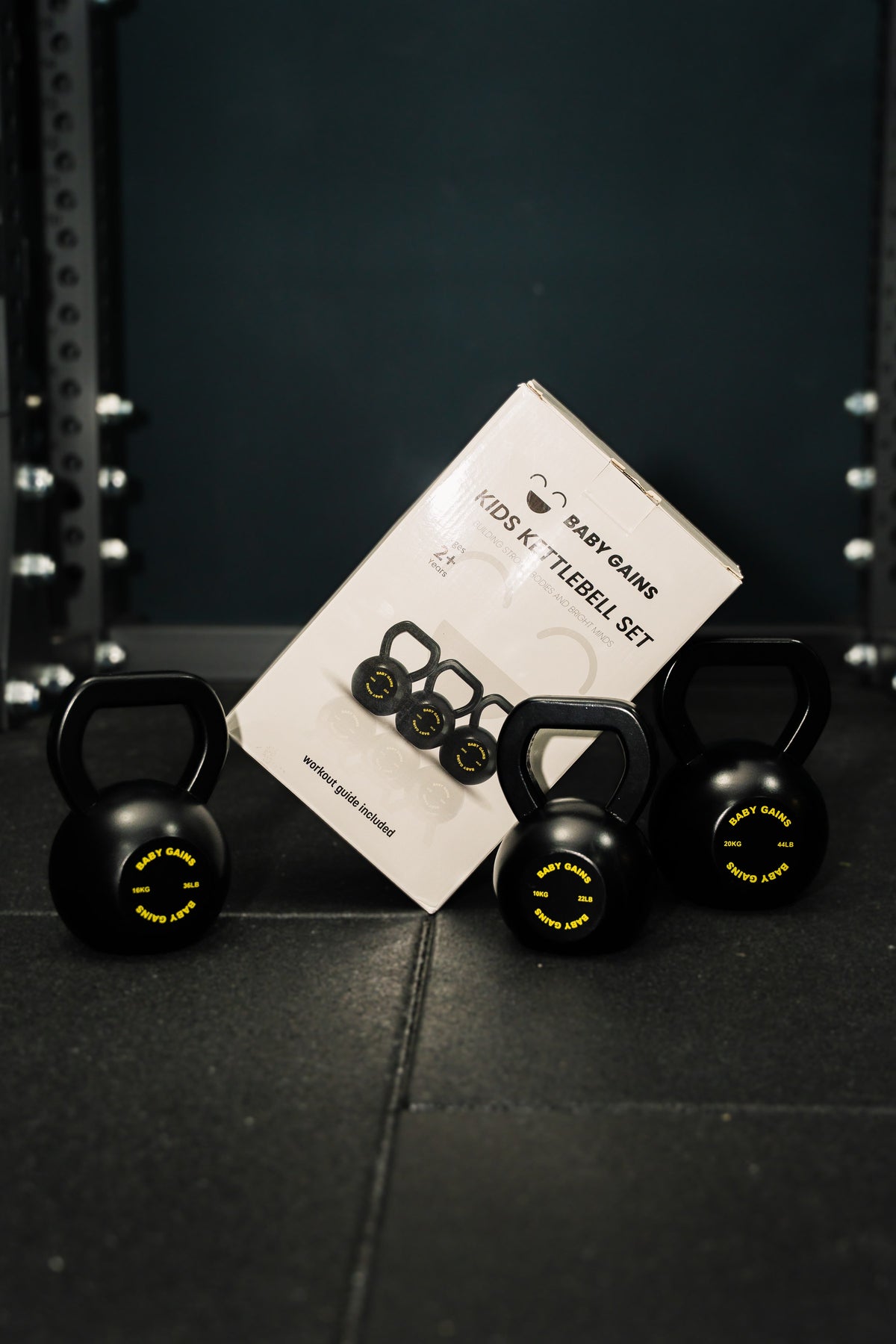 Baby Gains kids kettlebell set with box in a gym